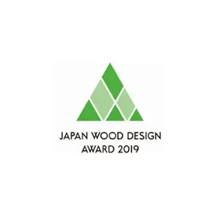 日本木材賞のロゴ。木の文字とデザインのシルエット